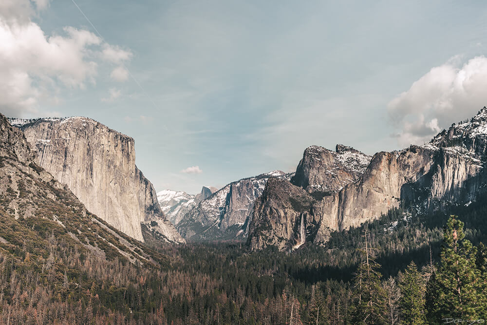 Tunnel view with El Capitan, Half Dome, and Bridal Veil Falls in Yosemite, CA