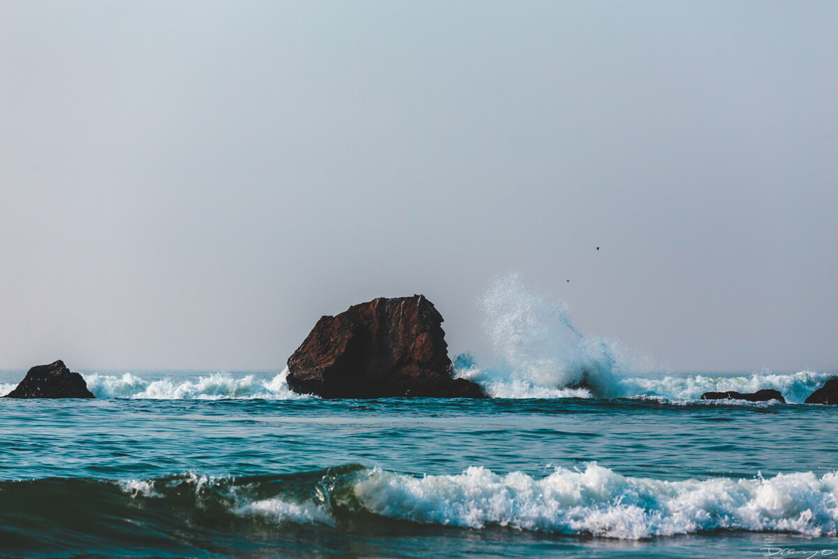Blue Wave Red Rock at Private Beach in Pacifica, CA