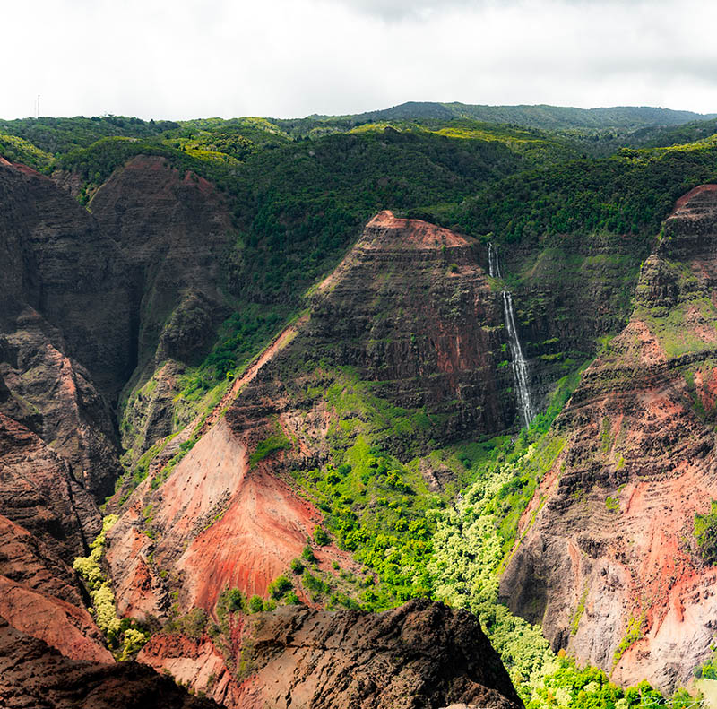Photos from Kauai, Hawaii in June of 2021. Photos of Waimea Canyon, Waimea Plantation, Snorkeling at Hideaway Beach, Red Dirt Waterfall, Kalepa Trail, Napali (Na Pali) Coast, Jack Harter Helicopter Tours, Kalalau Trail.